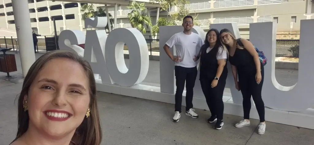 Três pessoas posando no São Paulo Boat Show 2024